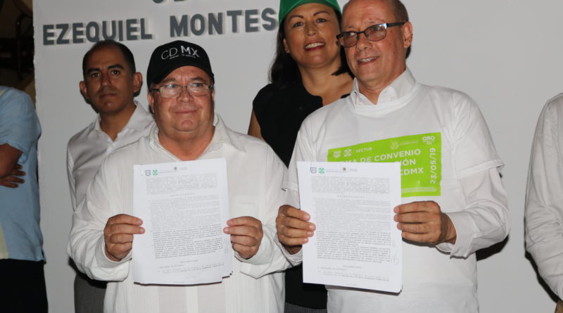 firma convenio en pro del turismo